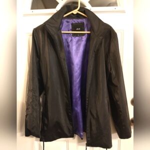 Black polyvinyl JLG New York Rain Lightweight Jacket. Size Large